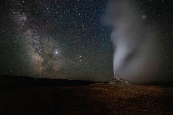 Wyoming-Yellowstone National Park Milky Way above erupting White Dome Geyser